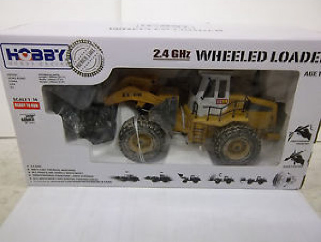Радиоуправляемый бульдозер HOBBY Wheeled Loader 2.4GHz (0706) Радиоуправляемый бульдозер HOBBY Wheeled Loader 2.4GHz (0706)